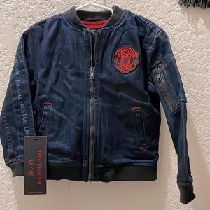 True Religion Manchester United kids denim jacket. NWT. Size 4.